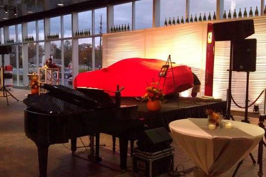 Scottie Alexander performing live at Ferrari of Troy, MI for Tom Celani