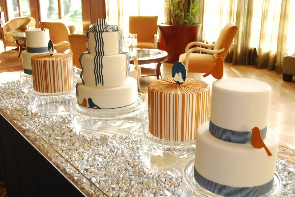 Wedding cake with fondant Toile ribbons and stylized flower