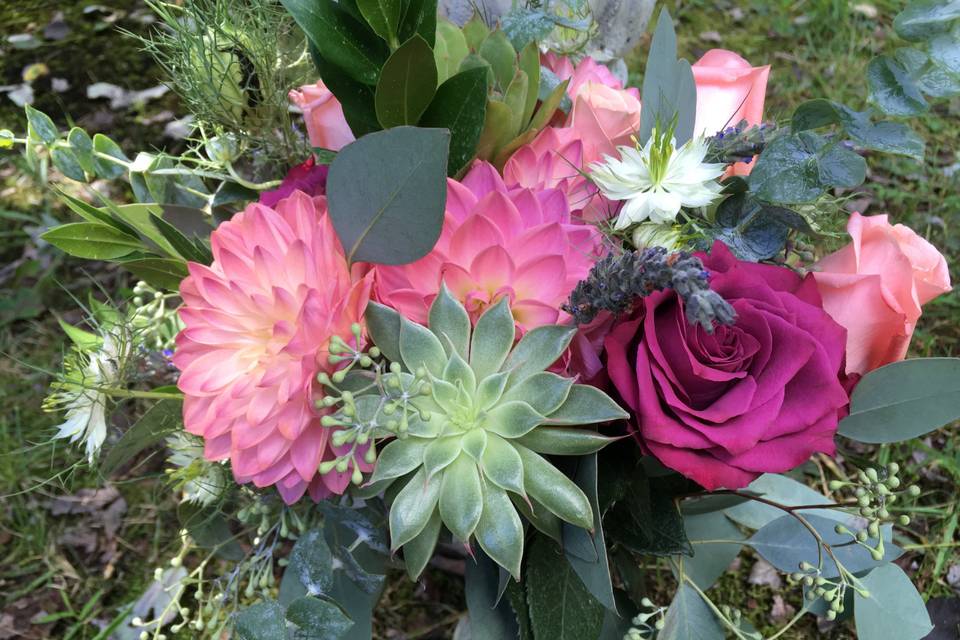 Succulents with coral bouquet