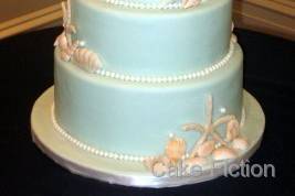 Seashells and Cattleya Orchids Wedding Cake