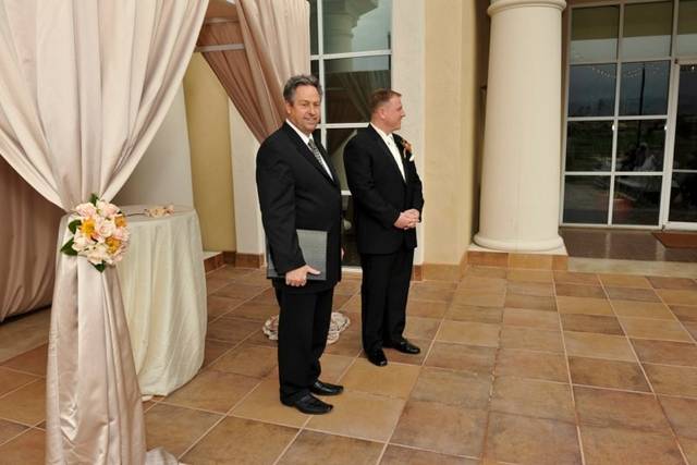 Officiant with the groom