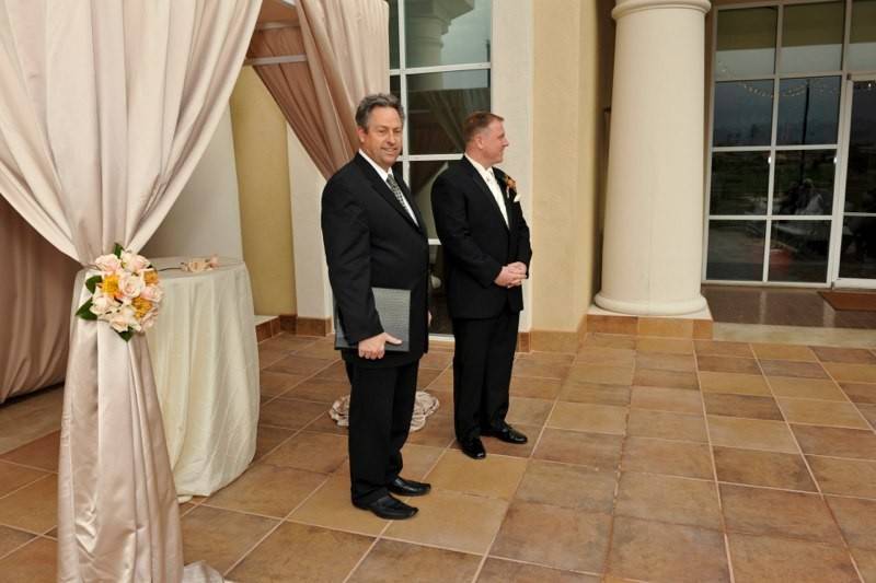 Officiant with the groom