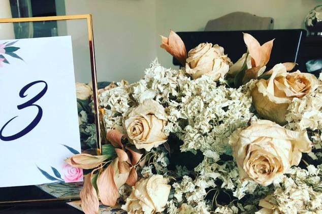 Table number and floral arrangement