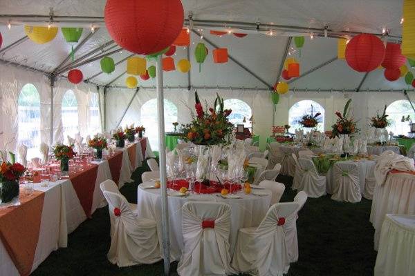 After the pool ceremony, the reception was held in a tent, decorated to enhance the 