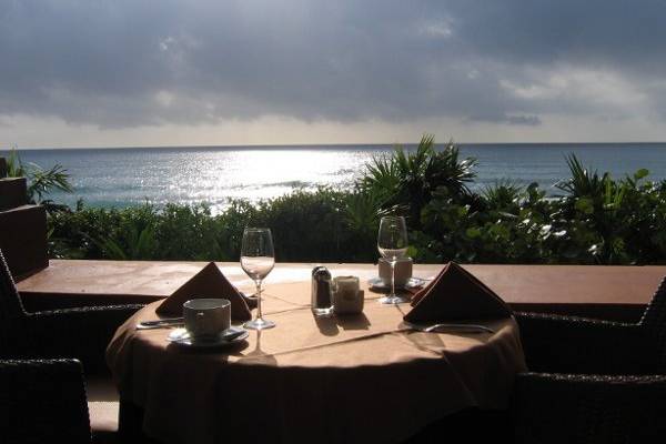 Barcelo Maya Palace a beautiful place for a destination Maya wedding on a sun set beach.