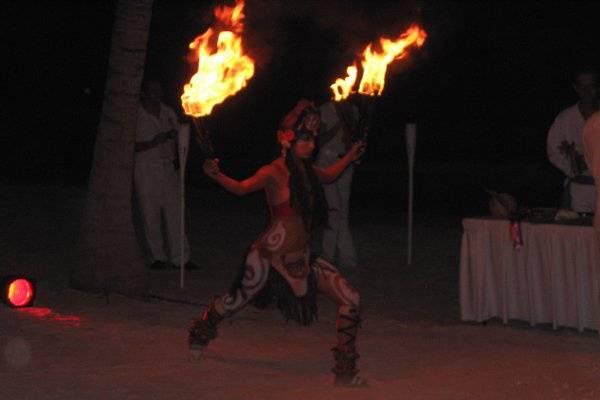 One of the Fire Dancers at the Maya Wedding.  For a Maya Wedding, the bride can arrive via canoe.