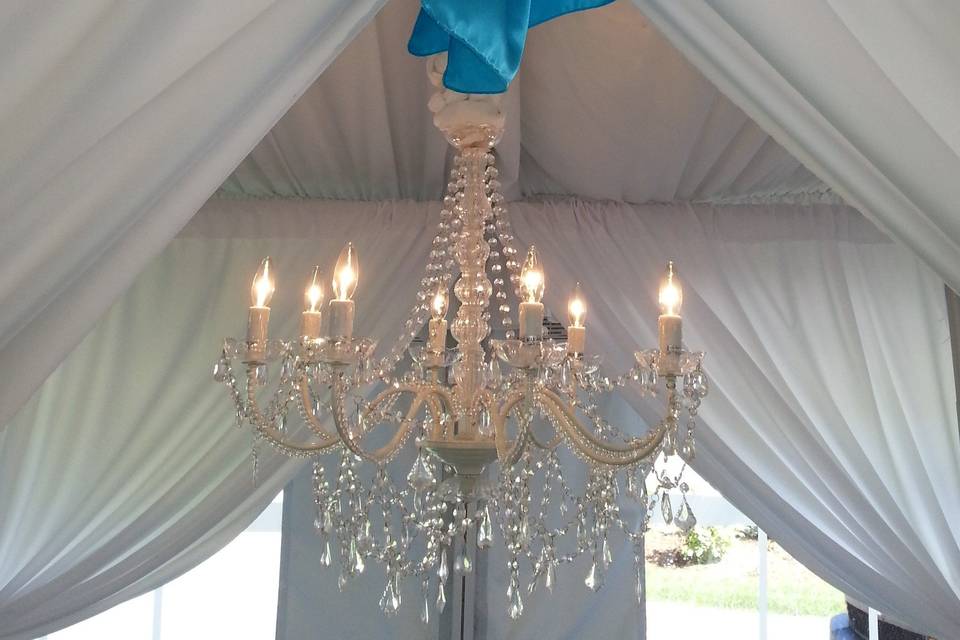 Our drapery and chandelier