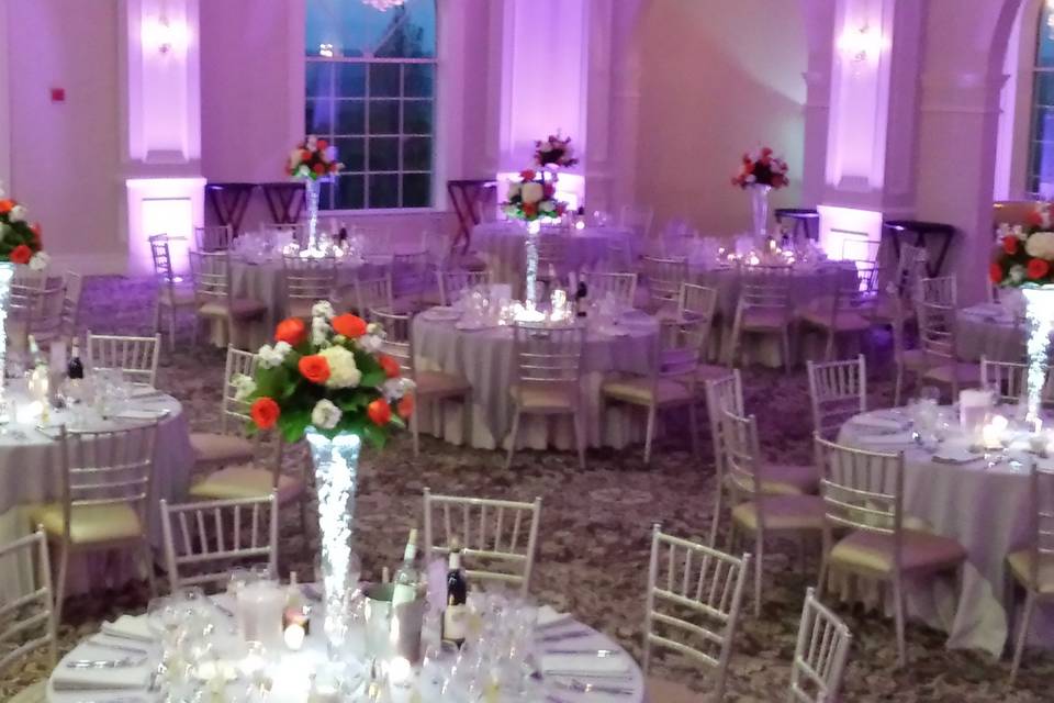 Table Settings - high centerpieces, our color up-lighting
