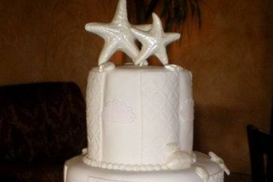 Wedding cake with starfish on top