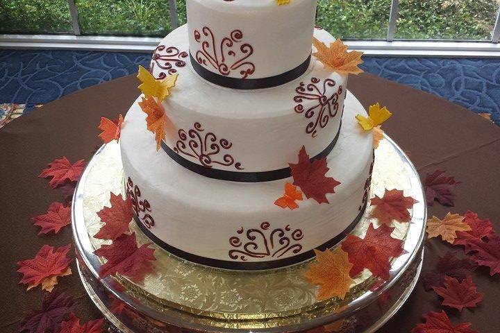 Wedding cake with autumn leaves