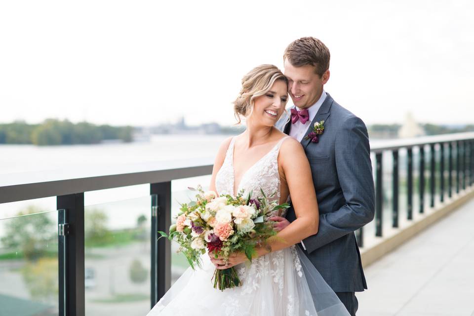 WEDDING COUPLE ON THE BALCONY