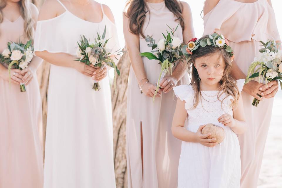 Flower girl with bridesmaids