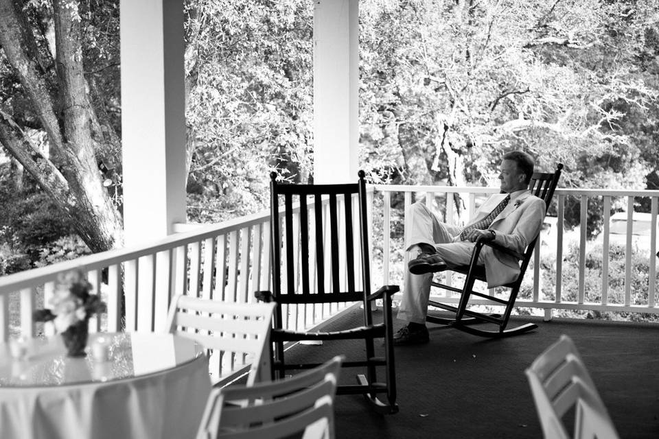 Guest relaxing on upper porch