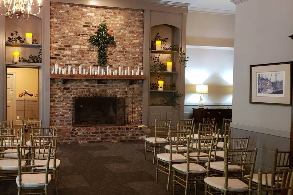 Ceremony in front of fireplace