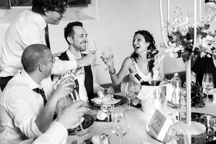 Guest toast the newlyweds ata wedding reception in Torino Catle