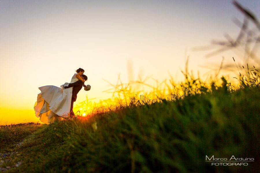 bride and groom portrait at the sunset