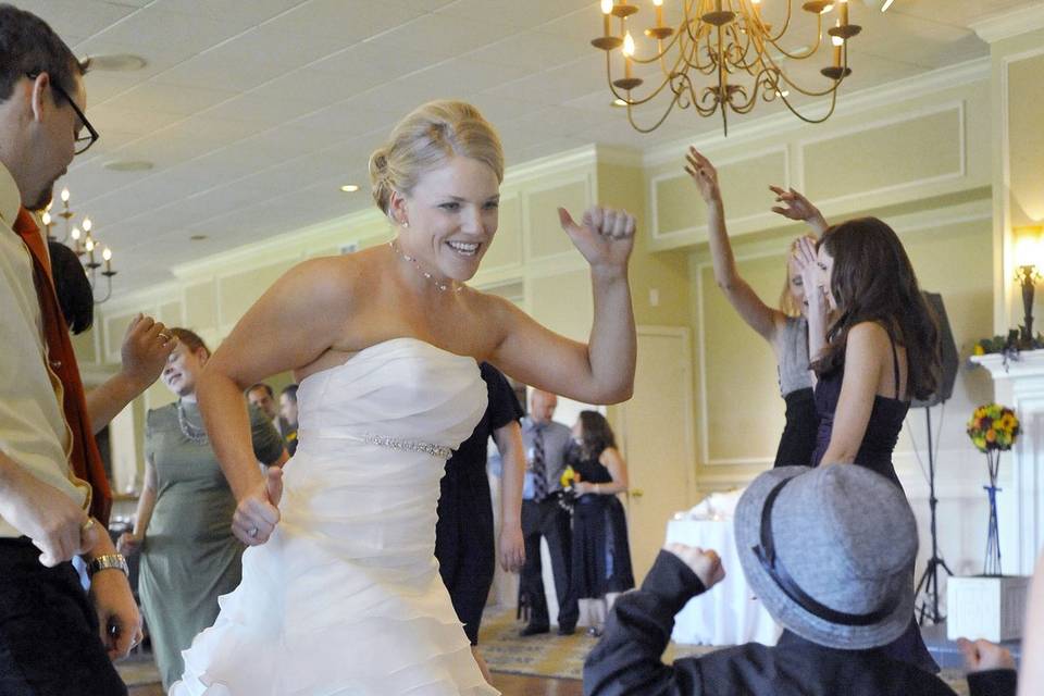 The bride dances with her nephew.