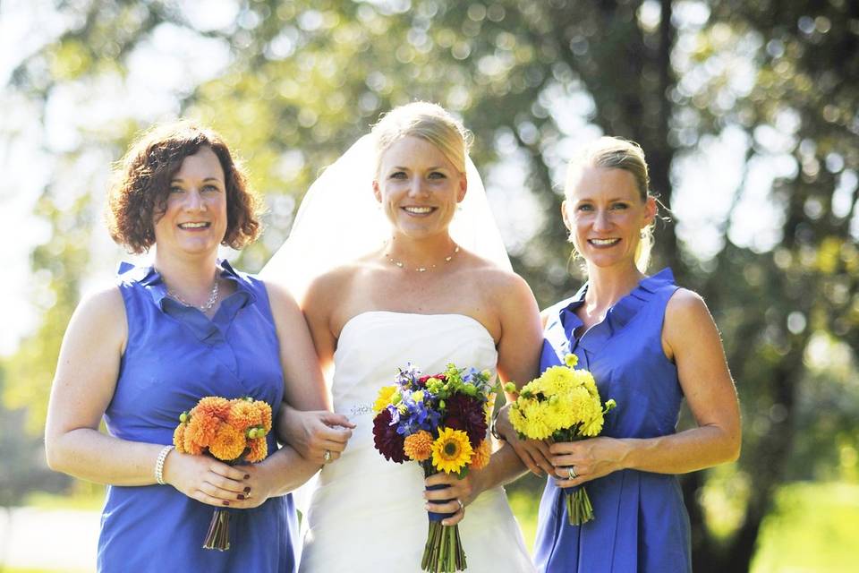 The bride and her bridesmaids, who are also her sisters