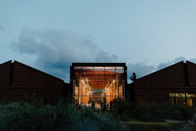 Venue lit up at night.