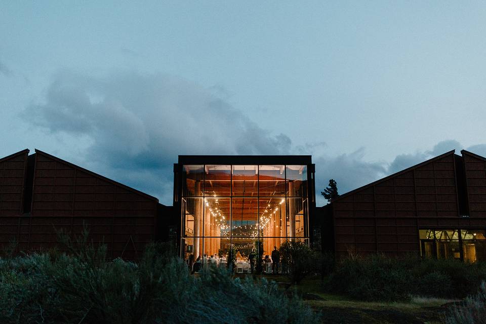 Venue lit up at night.