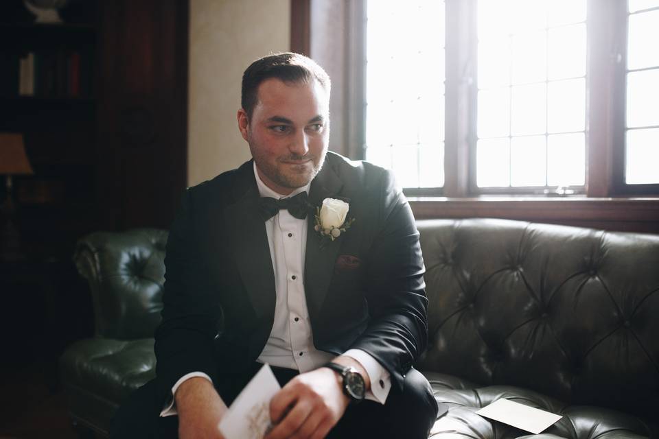 Groom reading a note