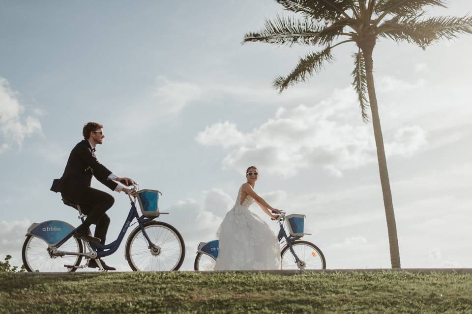 Bride and groom bike ride