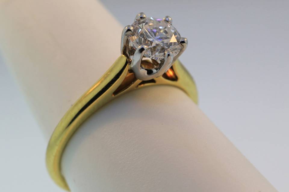 18k yellow gold and platinum solitaire diamond engagement ring. The diamond is a 1.02ct round. As is: $13,000.00
We can make this style with any shape or size center stone, including colors, in any color gold or platinum