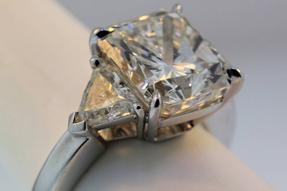 7.11carat total weight diamond ring with a modified radiant cut center. Platinum. $110,000.00
