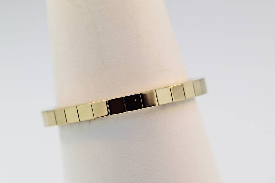14k yellow gold mirror finish wedding band. 2mm wide size 6. $550.00