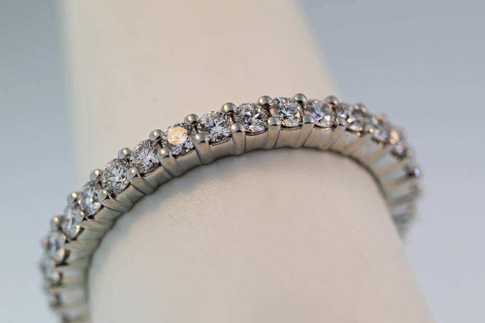 Platinum diamond eternity band in a shared prong setting. .91 carats in diamonds size 6.5 $5,000.00
