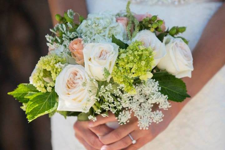 roses, baby breath and greenery with basket in Rockville, MD