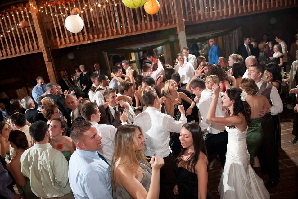 Couple and guests dancing