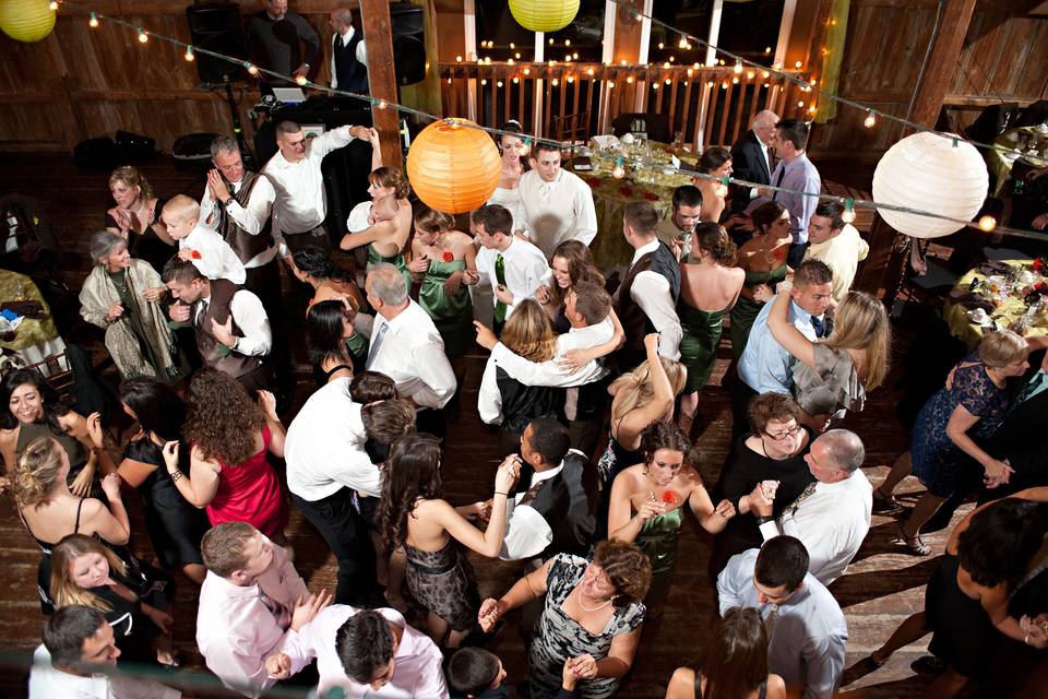 Couple and guests dancing