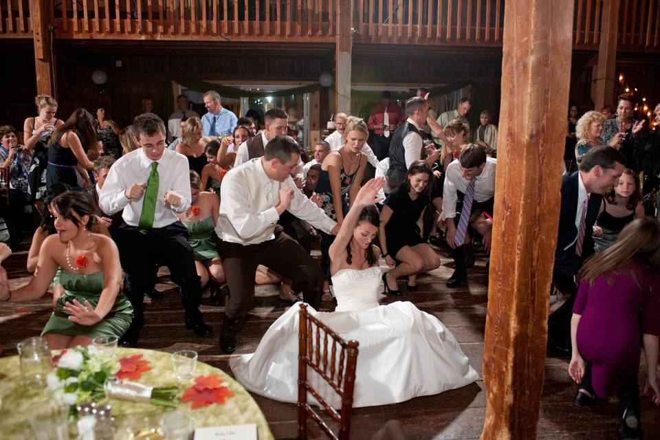 Couple and guests dancing