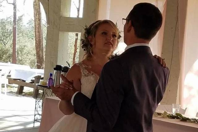 Bride dancing with guest