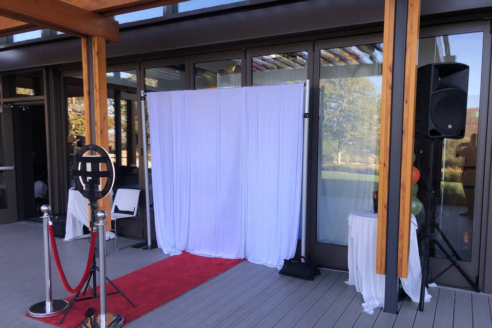 Photo booth with white backdrop