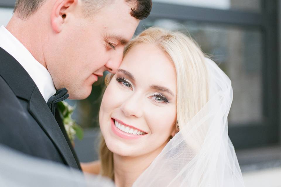 Bride Smiling With Groom