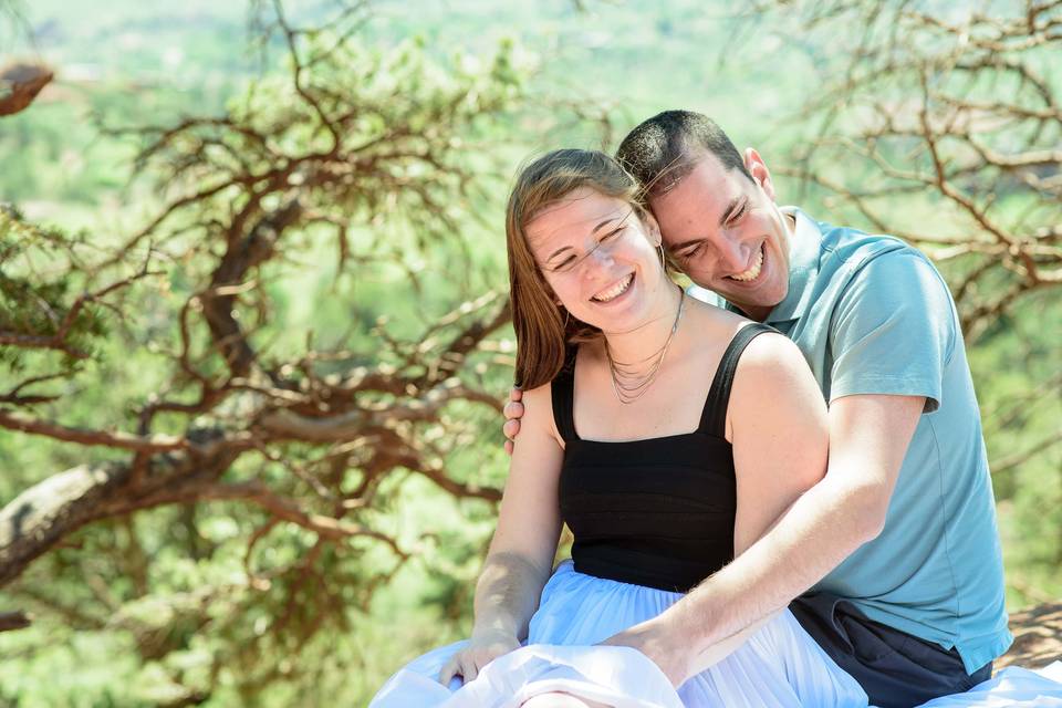 Couple laughing and hugging