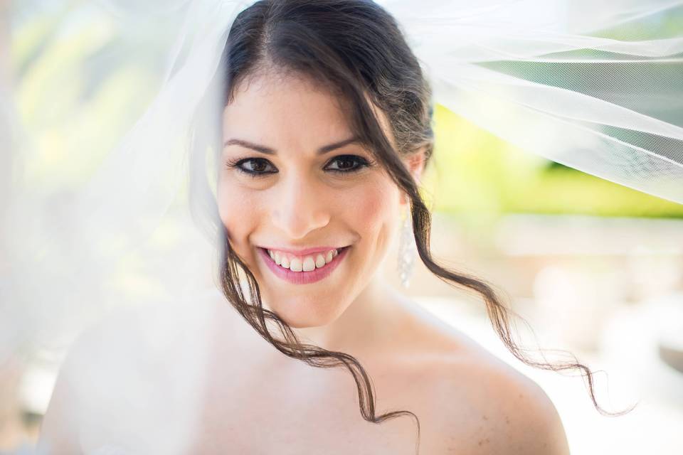 Bride smiling at camera