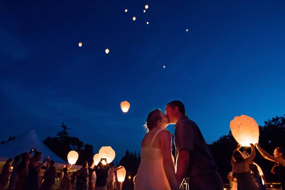 Magical lanterns above couple