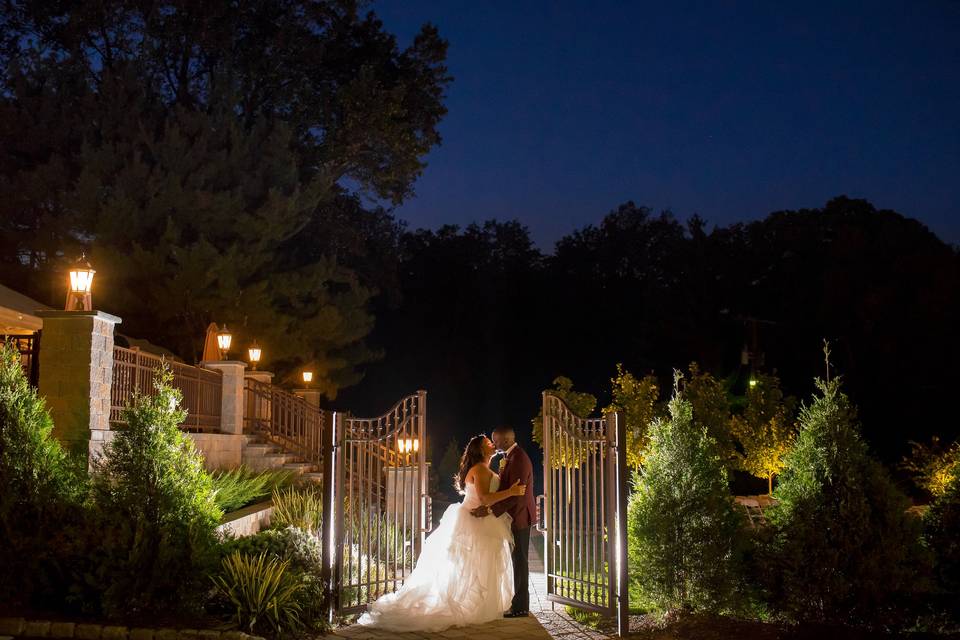 Night wedding photo at gates
