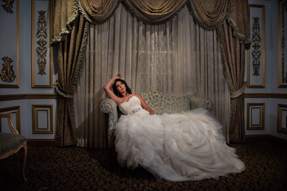 Dramatic bride on settee