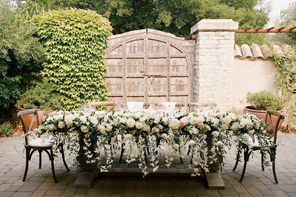 Head table cascade of flowers