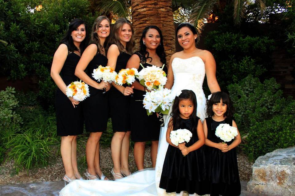 The bride with bridesmaids and flower girls