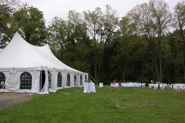 Beautiful site for a tent reception and wedding by the lake.