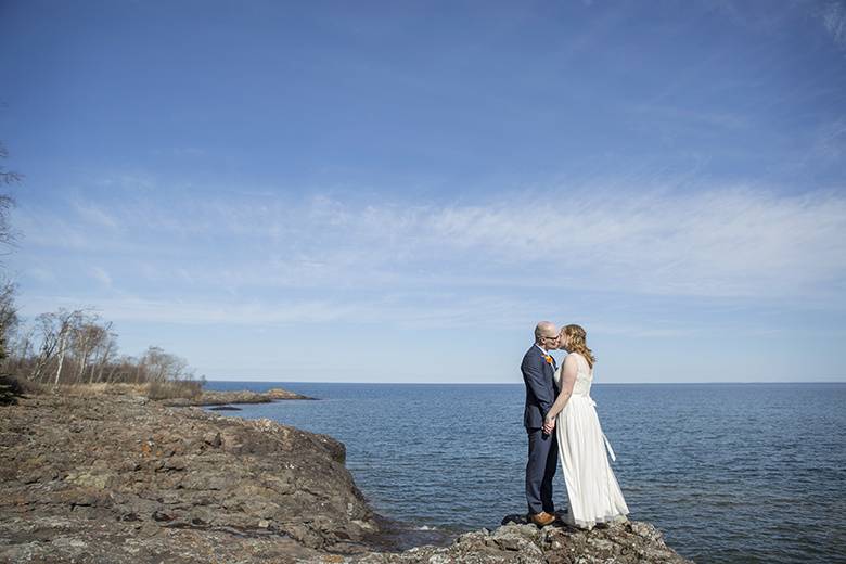 By the water