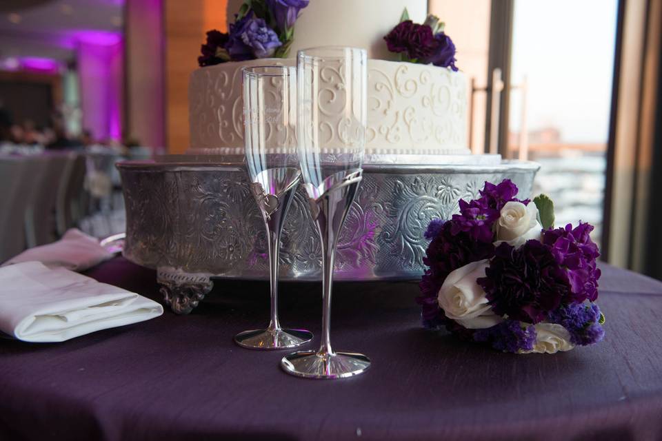 Sparkling wine glass near the wedding cake