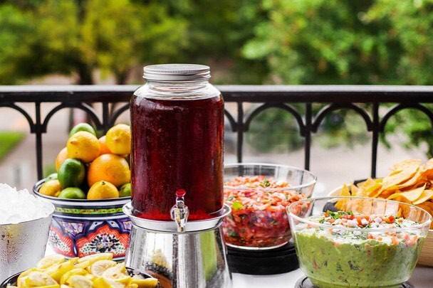 Tea and beverage station with appetizers - Chips, guacamole, and pico de gallo!