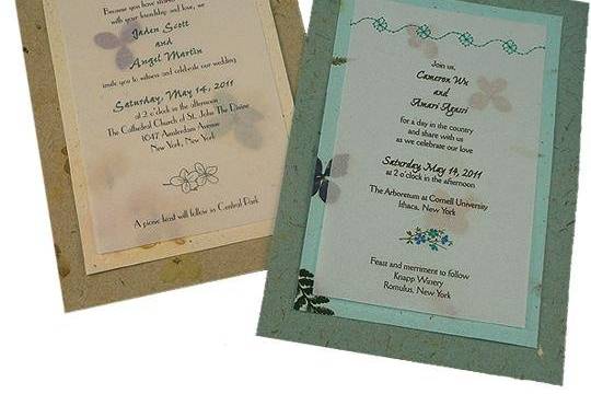 100% recycled handmade double-panel wedding invitations in moss and bluegrass with flower stitching. Custom calligraphy services, plantable seed paper and DIY Kit available!