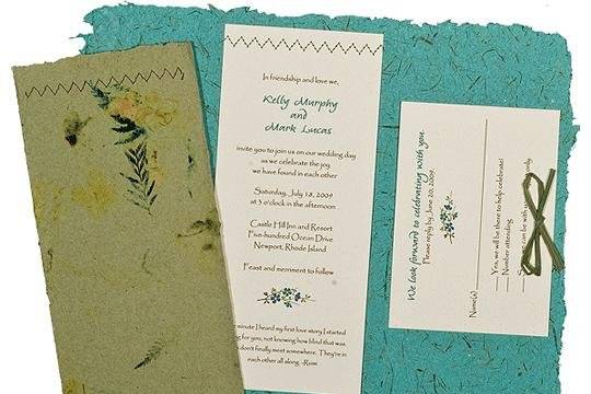 100% recycled handmade fold-up wedding invitation in olive and bluegrass with olive raffia tie and zig-zag stitching. Custom calligraphy services, plantable seed paper and DIY Kit available!